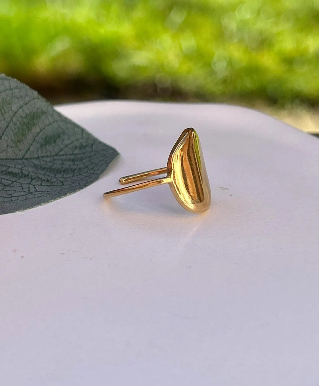 Simple, Chic and Timeless - a Waterproof Gold Ring in an Adjustable Size with a Smooth Gold Disc in an on Trend Irregular Finish