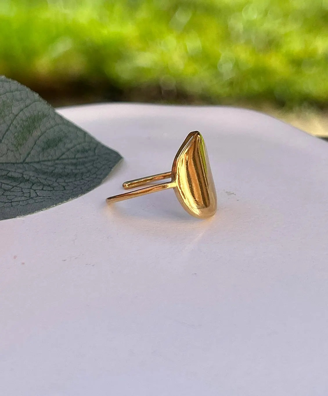 Simple, Chic and Timeless - a Waterproof Gold Ring in an Adjustable Size with a Smooth Gold Disc in an on Trend Irregular Finish