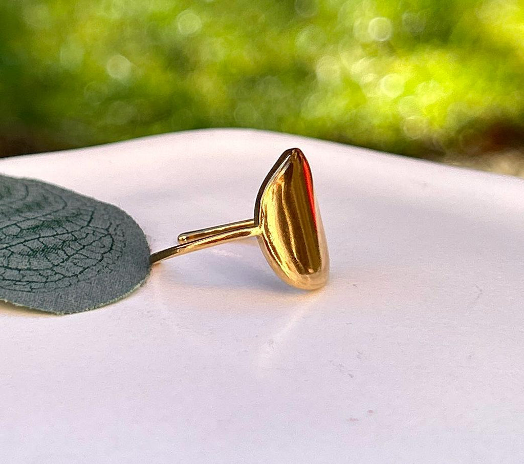 Simple, Chic and Timeless - a Waterproof Gold Ring in an Adjustable Size with a Smooth Gold Disc in an on Trend Irregular Finish