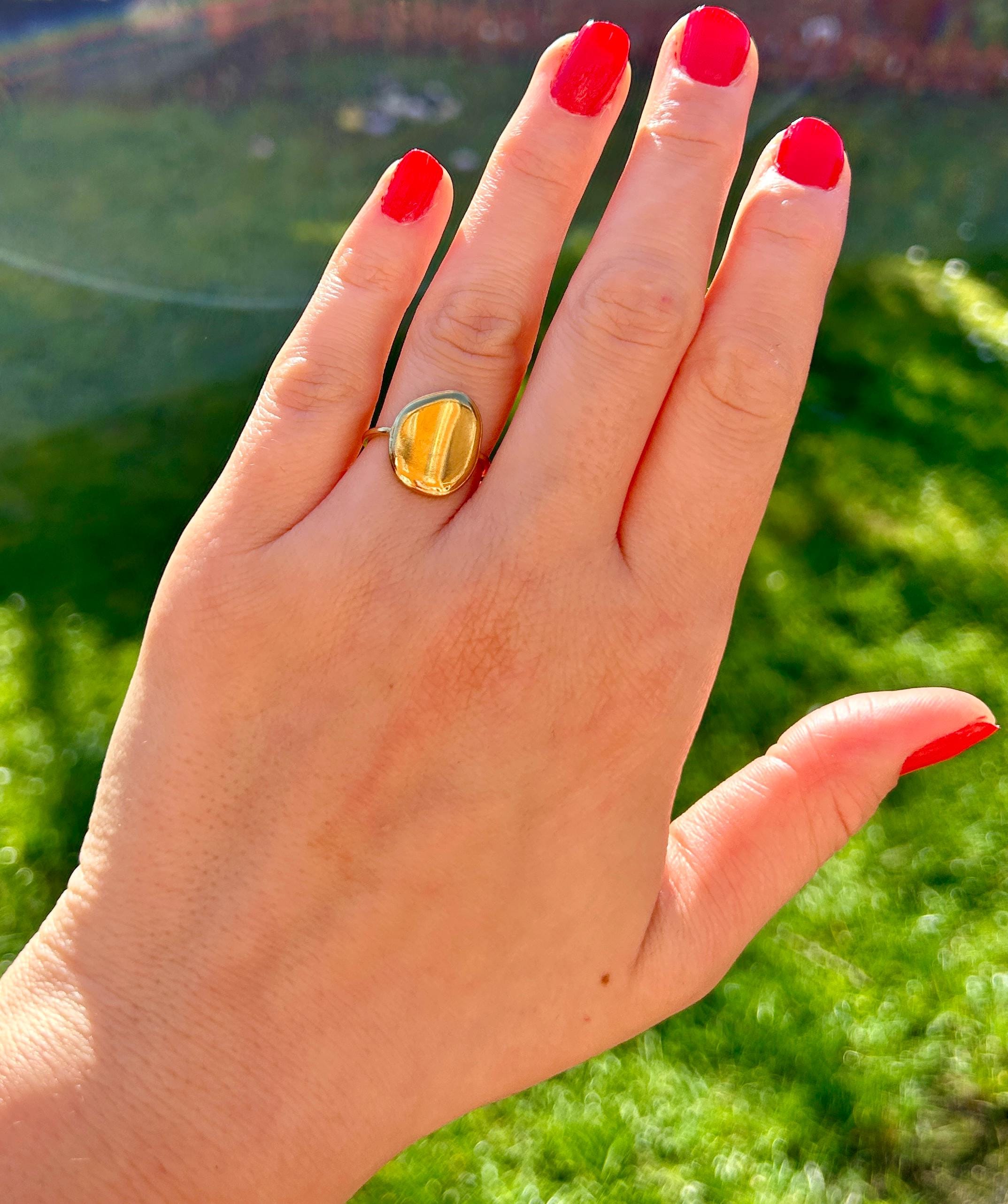 Simple, Chic and Timeless - a Waterproof Gold Ring in an Adjustable Size with a Smooth Gold Disc in an on Trend Irregular Finish
