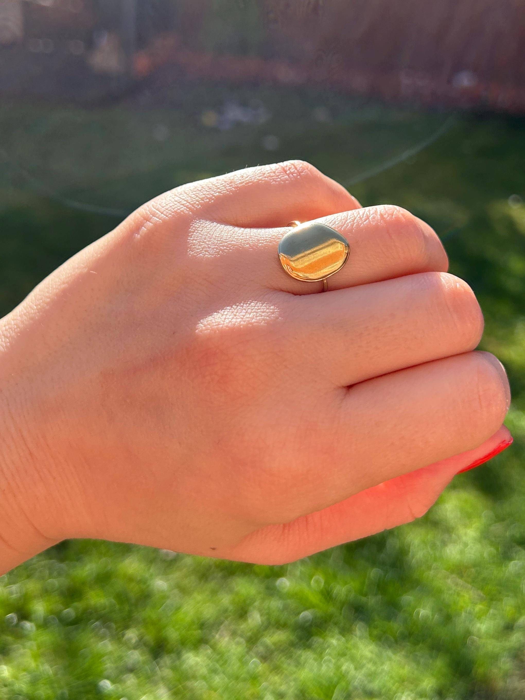 Simple, Chic and Timeless - a Waterproof Gold Ring in an Adjustable Size with a Smooth Gold Disc in an on Trend Irregular Finish